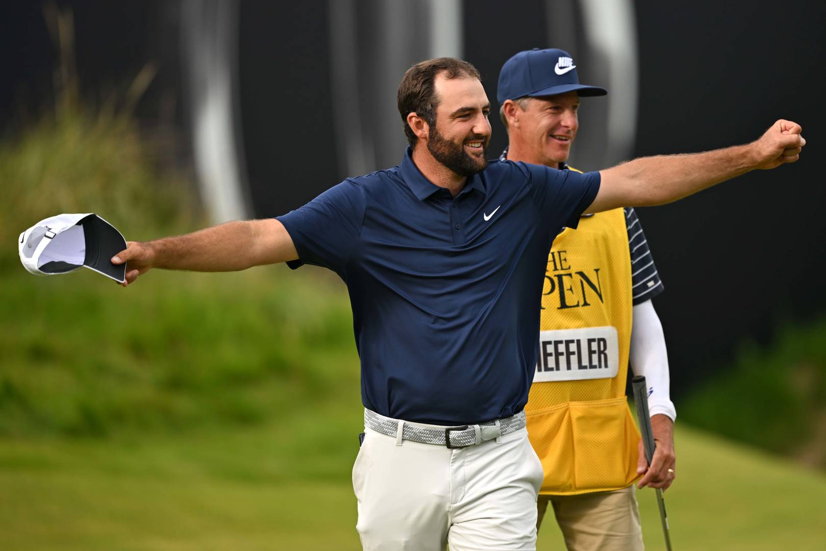 Scottie Scheffler celebrates on the 18th green at Royal Portrush.